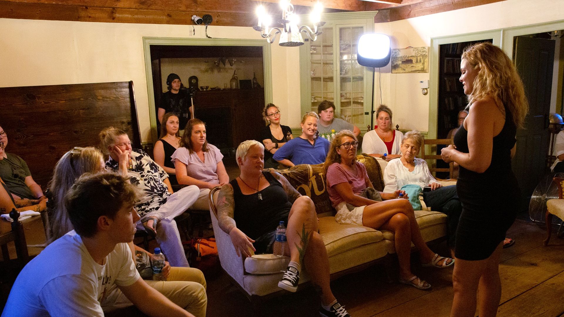 Guided tour group inside the historic farmhouse at the Old Arnold Estate